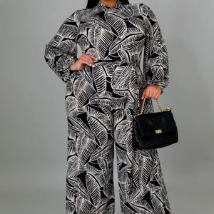 Plus Size MULTI PRINT LONG SLEEVE BELL BOTTOM JUMPSUIT